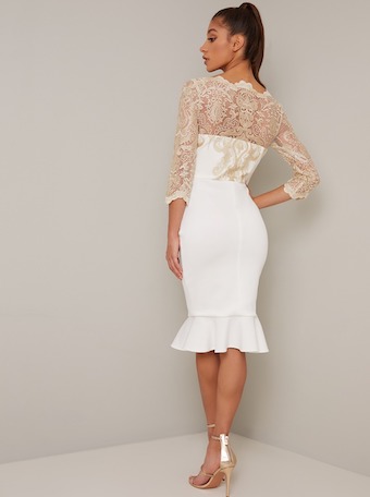 cream peplum dress