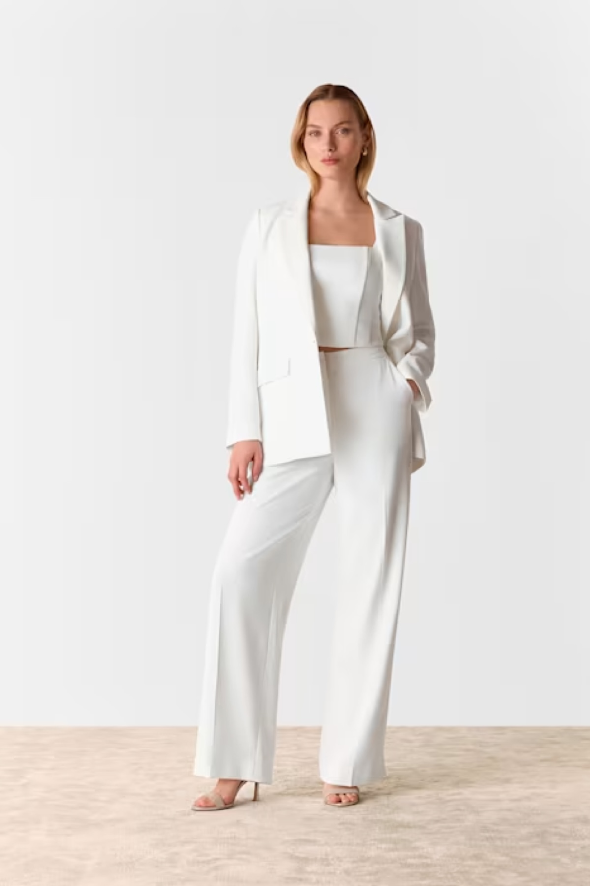 Ivory Andie Wedding Blazer, £299 | Ivory Structured Corset Bridal Top, £229 | Ivory Andie Wedding Trouser, £229